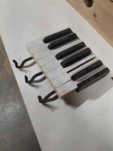 Coat hanger that looks like a keyboard
