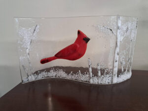 Red cardinal in glass 