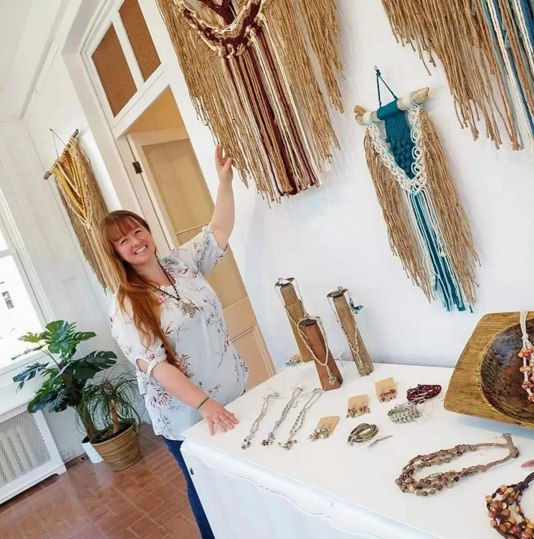 Woman with jewellery and macrame display