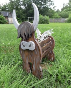Wooden yard cow
