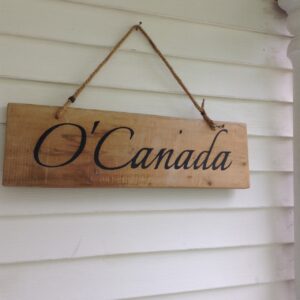 Wooden O'Canada sign