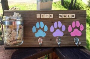 Sign with paw prints and dog bone jar