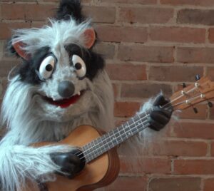 Stuffed animal playing guitar