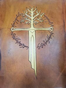 Leather sleeved book with cross