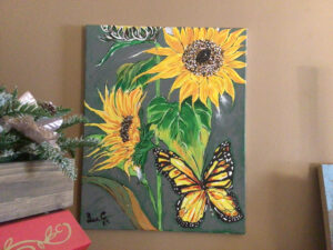 Painting of sunflowers and butterfly