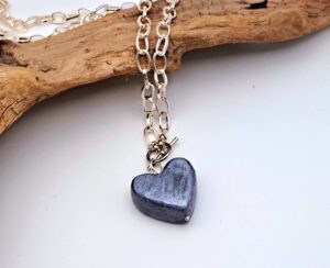 Blue heart necklace on silver chain