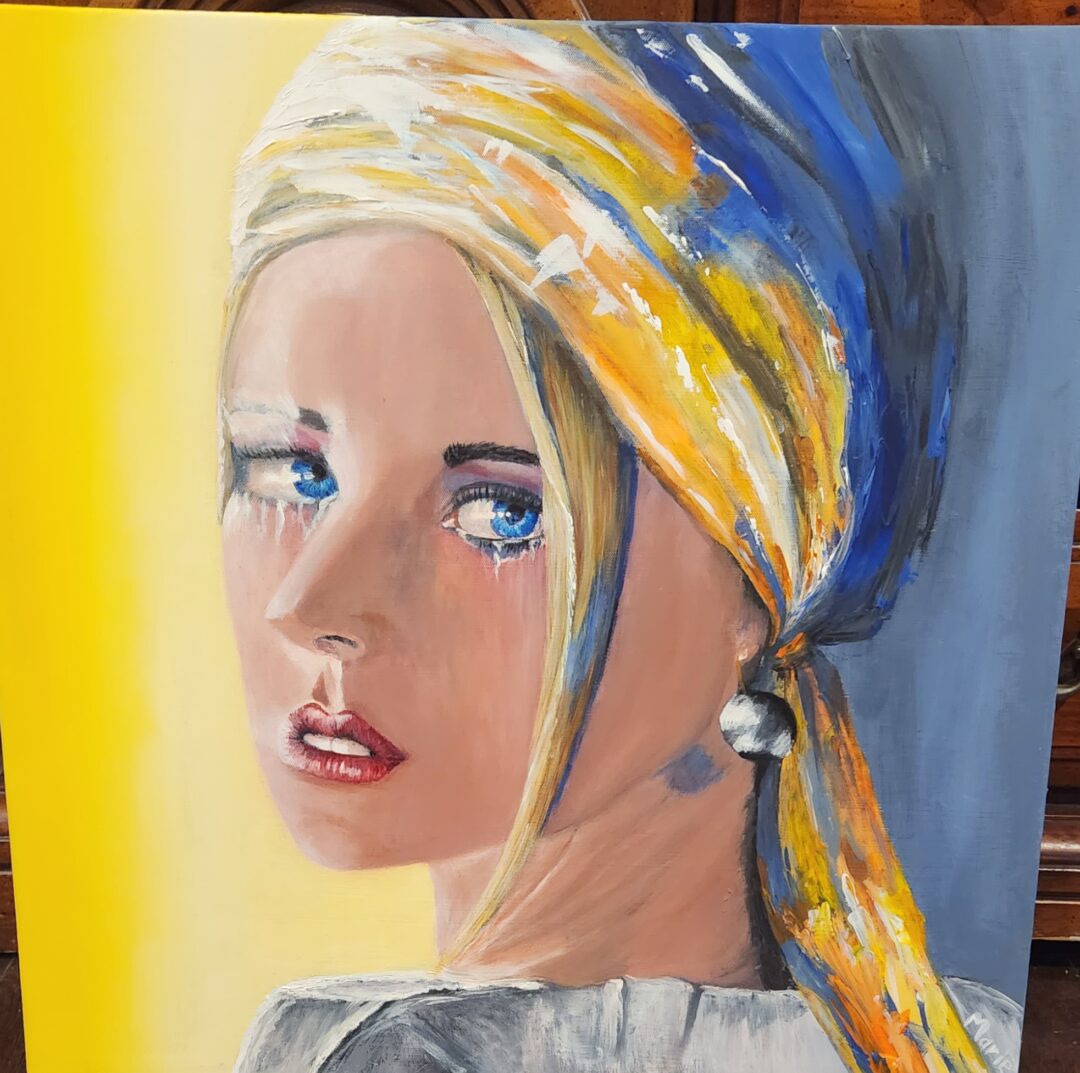 Woman with yellow and blue head scarf