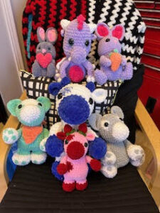Assortment of crocheted plush animals